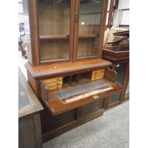 710 - Vintage bookcase unit with carved panel lower cupboard