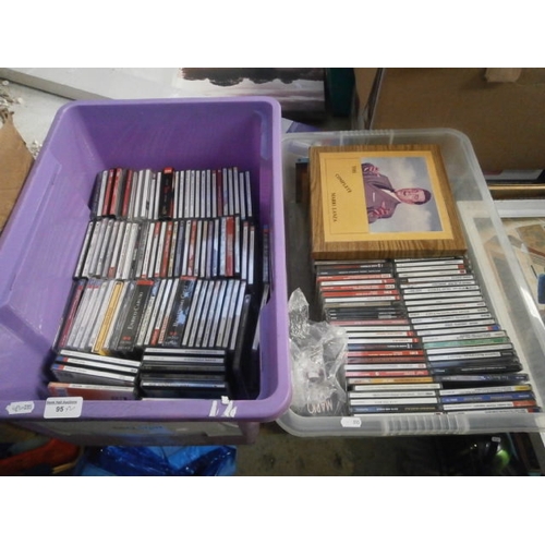 95 - Two boxes of CDs