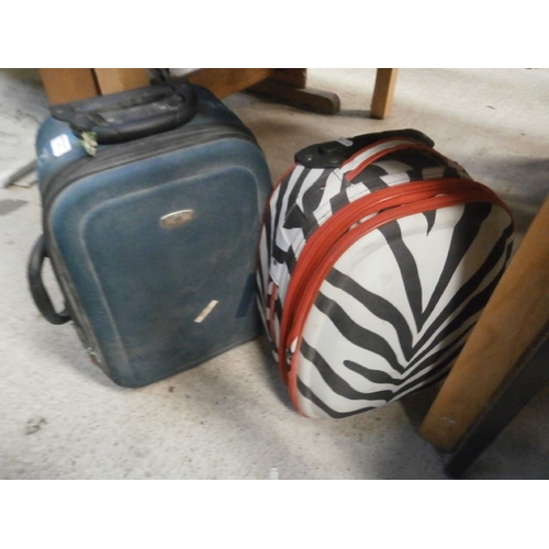 103 - Two small suitcases