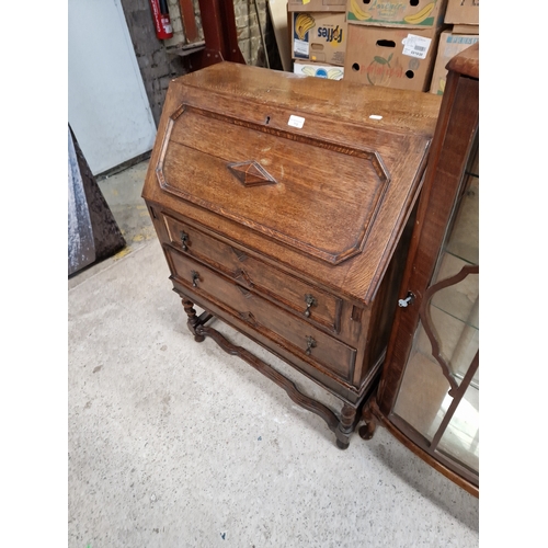 712 - Two drawer bureau on barley twist legs with key