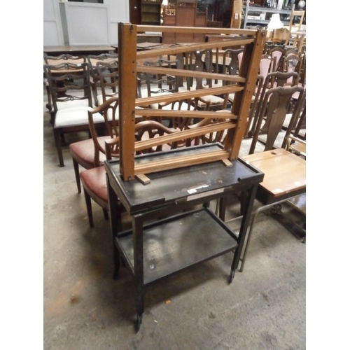 657 - A vintage 2 tier fold top trolley and a novelty marble run racing game frame