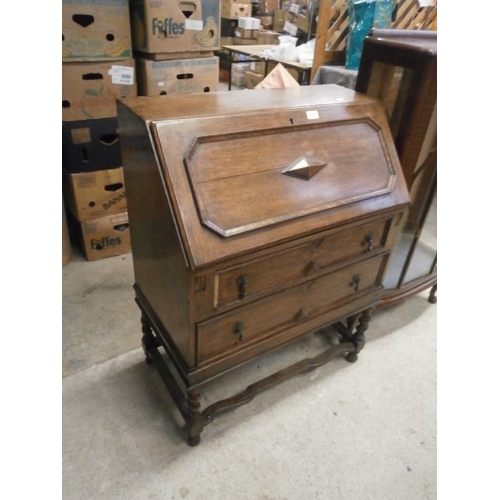 712 - Two drawer bureau on barley twist legs with key