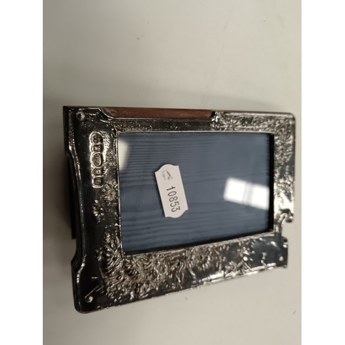 198 - Two silver hallmarked photo frames, one 999 silver