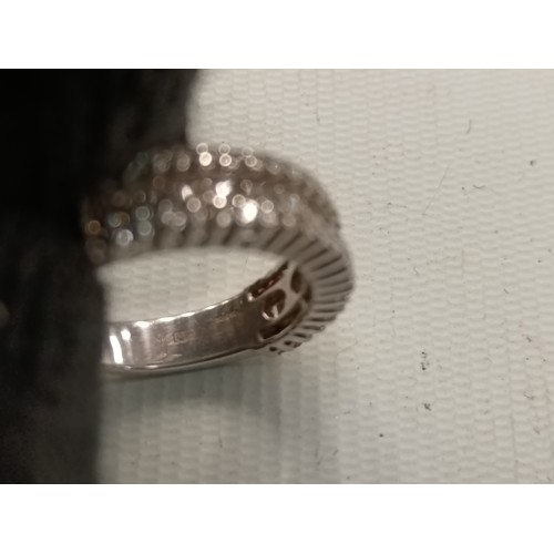 205 - 18ct white gold and diamond D079 ring with serial number 855895, tested at jewellers.