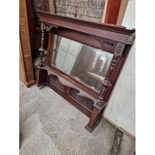 607 - A large carved mahogany framed vintage mirror