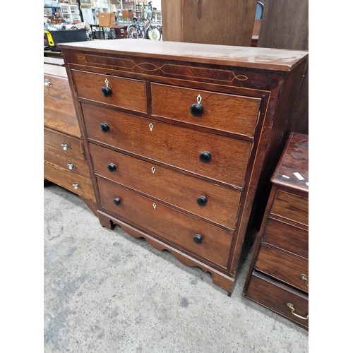 611 - A large antique oak inlaid 2 over 3 drawer chest