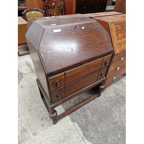 613 - A vintage 2 drawer fall front bureau