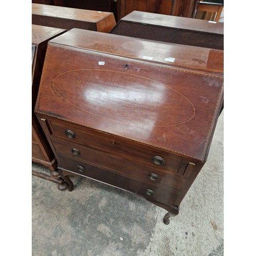 614 - A vintage inlaid 3 drawer bureau