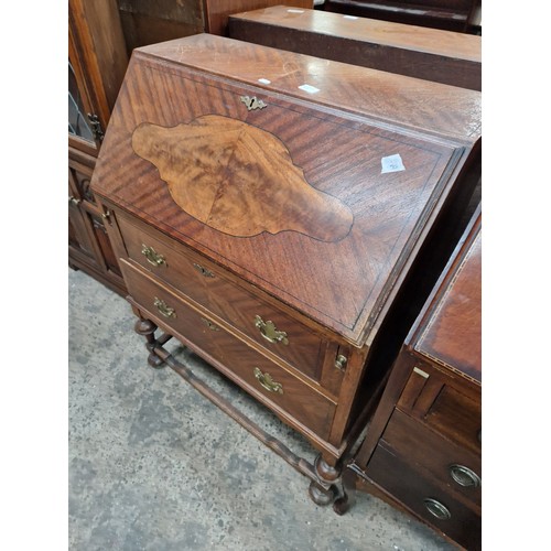 615 - A vintage 2 drawer fall front bureau