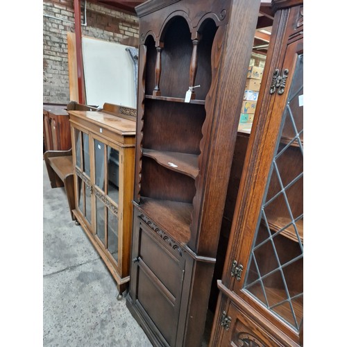 617 - A vintage carved oak open corner cabinet