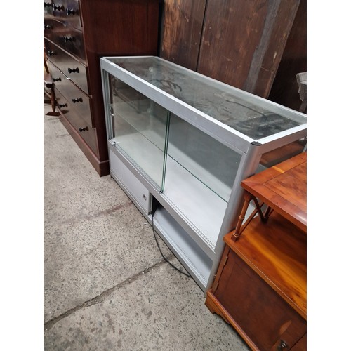 624 - A glazed retail counter cabinet