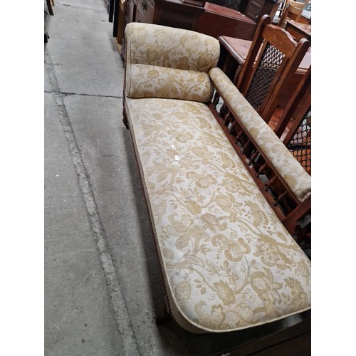 638 - A large vintage carved oak framed upholstered Chaise longue