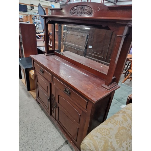 639 - A vintage carved mahogany 2 door mirror backed sideboard