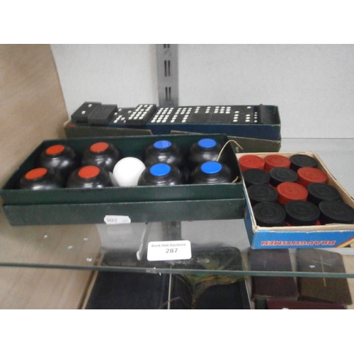 287 - Lot inc carpet boules set, dominoes and draughts