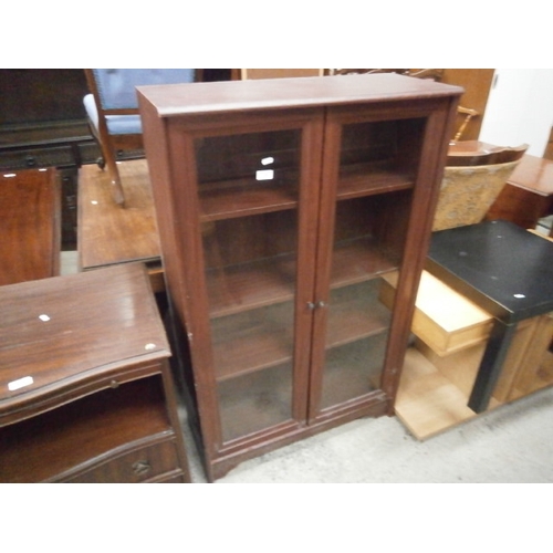 641 - A 2 door glazed cabinet