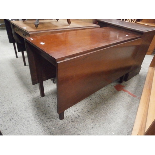 644 - A very large antique drop leaf dining table with swing-out legs