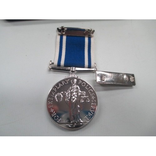 308 - Collection of a police officers police memorabilia