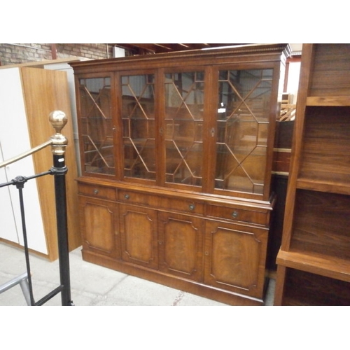 652 - A large glazed vintage 3 drawer flame mahogany wall unit