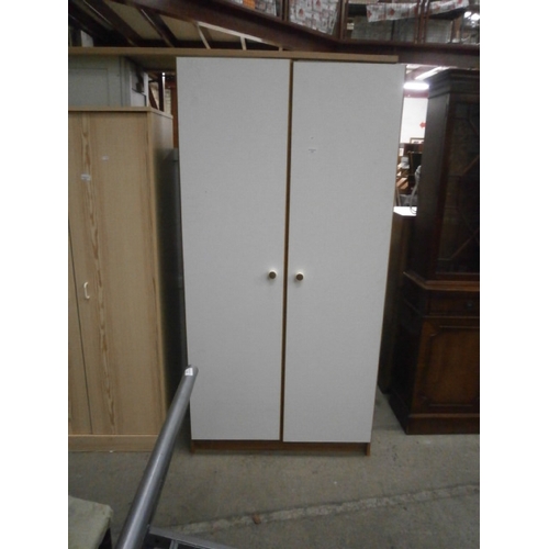 653 - A 2 door white wardrobe