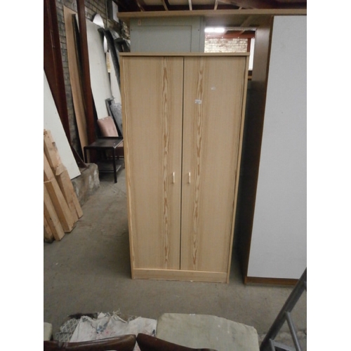 654 - A small 2 door wardrobe