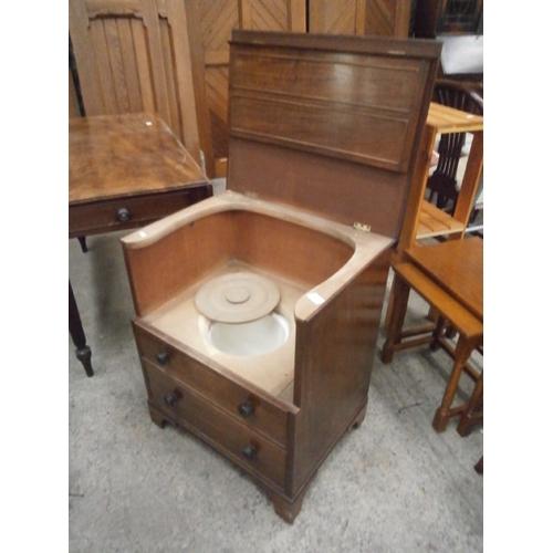 672 - A vintage lift top commode chair with pot