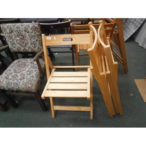 699 - 3 x folding wooden chairs