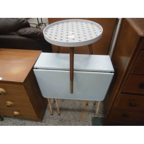 710 - A small vintage folding gate leg table with metal frame and Formica top and a circular retro occasio... 