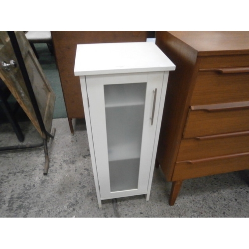 717 - A small white cabinet with glazed door