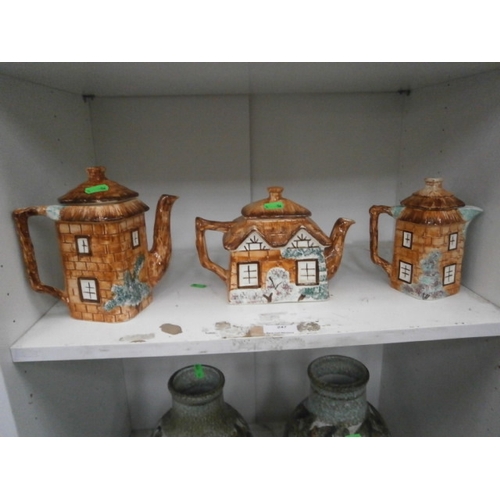 247 - Three cottage ware teapots