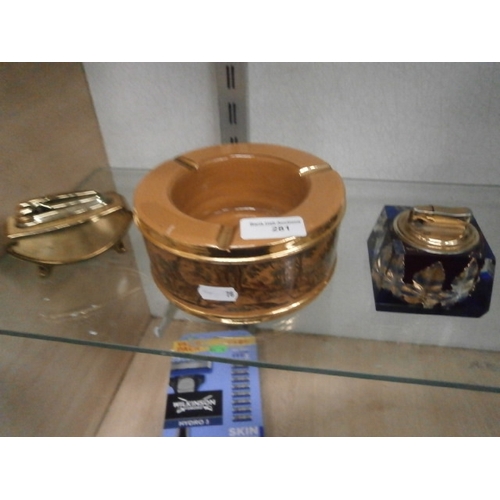 281 - Lot inc handmade ashtray and two assorted table lighters