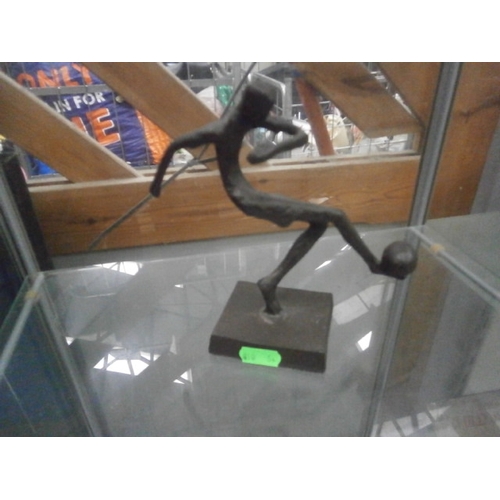 298 - Metal footballer figurine