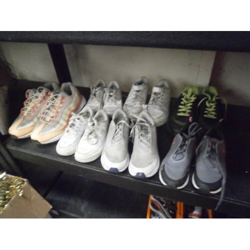 42 - Seven assorted pairs of Nike trainers