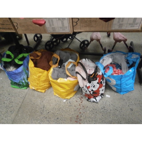 135 - Five bags of assorted clothing