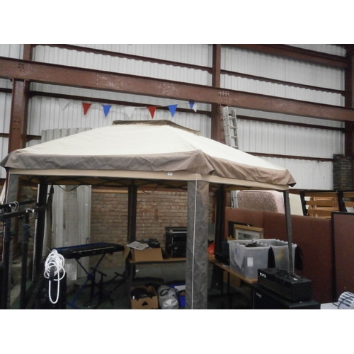 617 - A large 6 sided pop up metal framed Gazebo with side netting in good condition