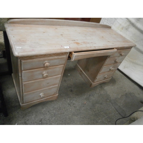 641 - A 9 drawer limed wooden dressing table / desk