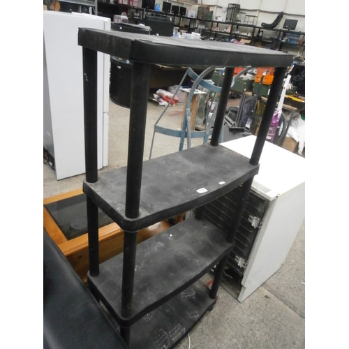 646 - A 4 tier plastic stacking shelf stand