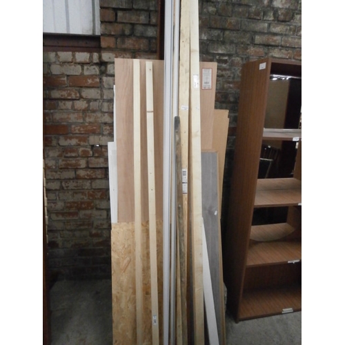 656 - A quantity of assorted timber lengths and wood panels