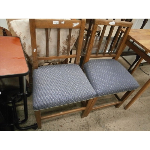 661 - A pair of vintage dining chairs with upholstered seats