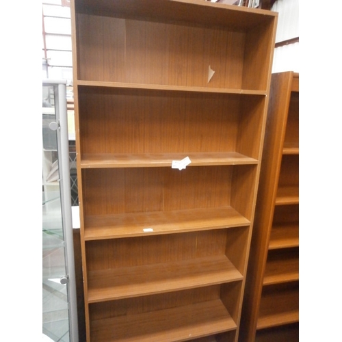 668 - A large open shelf unit