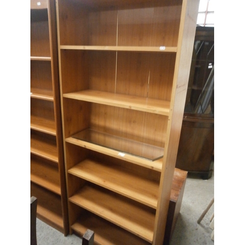 670 - A large open shelf unit