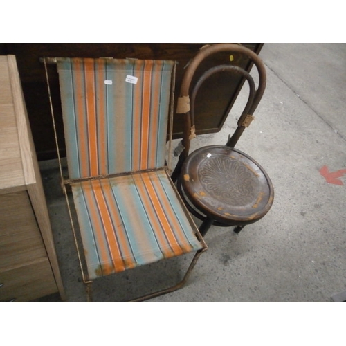 675 - A small vintage Bentwood chair and a folding garden chair