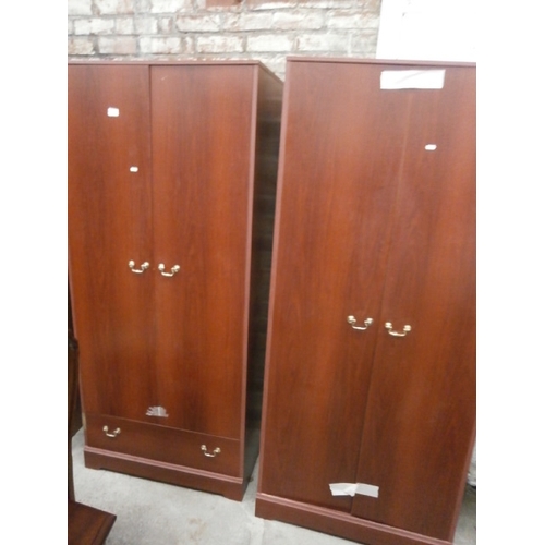 679 - A pair of 2 door wardrobes one with lower drawer