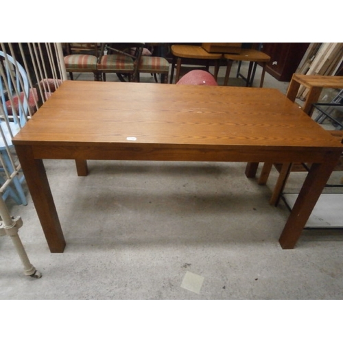 701 - A large wooden dining table