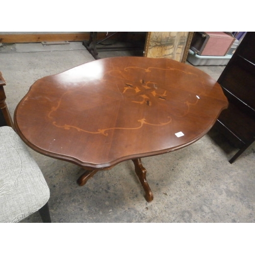 706 - A shaped vintage inlaid pedestal coffee table