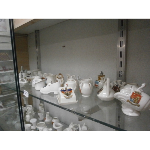 294 - Shelf lot of crested ware