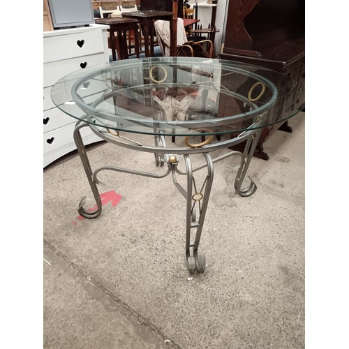 715 - Metal framed glass top table