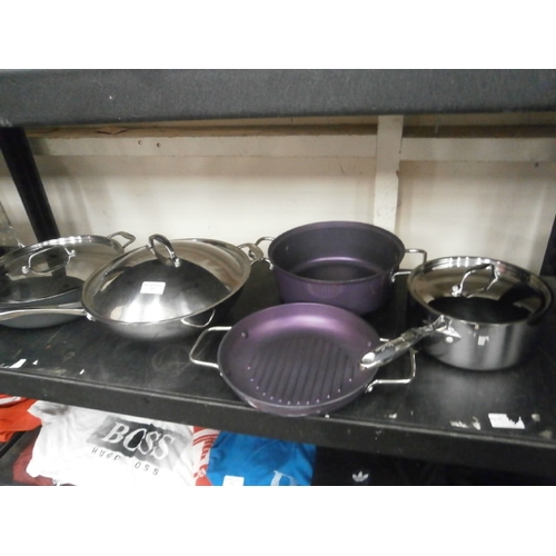 73 - Four assorted lidded pans