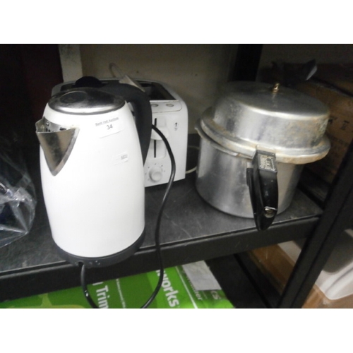 34 - Lot inc four slice toaster, kettle and steam pot
