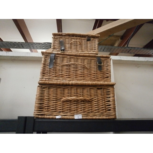 53 - Set of three wicker baskets
