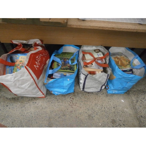 132 - Four bags of books